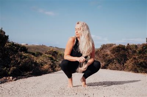 Girl on gravel or sandy road