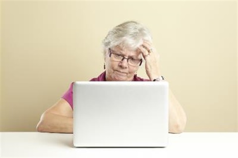 Older lady in front of laptop